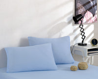 Трикотажне простирадло на гумці з наволочками 160×200