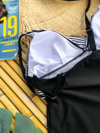 Суцільний купальник із смугастим ліфом на перехрест