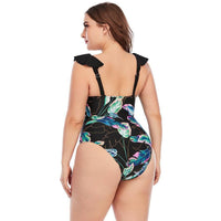 Злитий купальник з рюшами та тропічним принтом, plus size