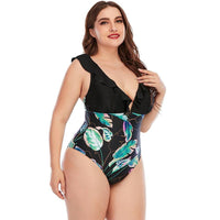 Злитий купальник з рюшами та тропічним принтом, plus size