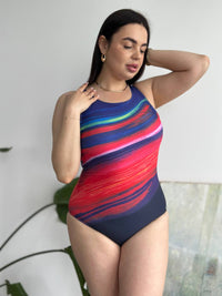 Суцільний купальник plus size з яскравим смугастим принтом