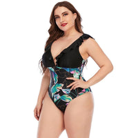 Злитий купальник з рюшами та тропічним принтом, plus size