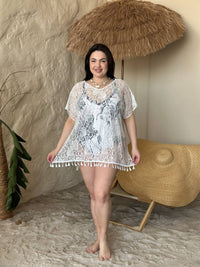 Біла мережива пляжна туніка з китицями plus size